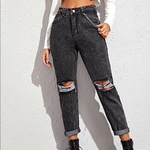 Ripped mom jeans with chain